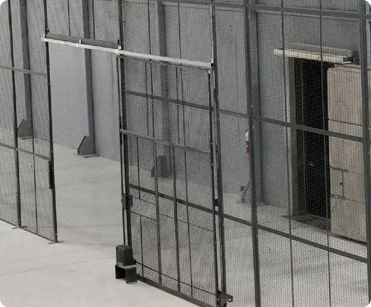 DEA-compliant wire cage door with self-closing and self-locking access control hardware.